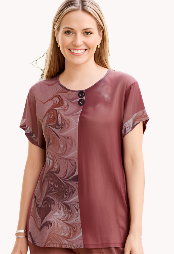 woman wearing a hand dyed and marbled silk top in brown colors against a white background