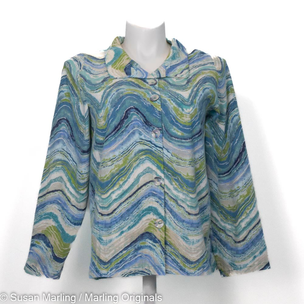 Cotton canvas jacket with collar and long sleeves shown on mannequin with white background