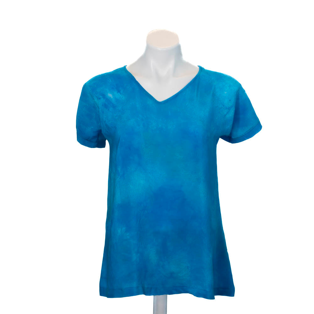 Marble silk top in hand, dyed blue mottled tones on a mannequin against a white background