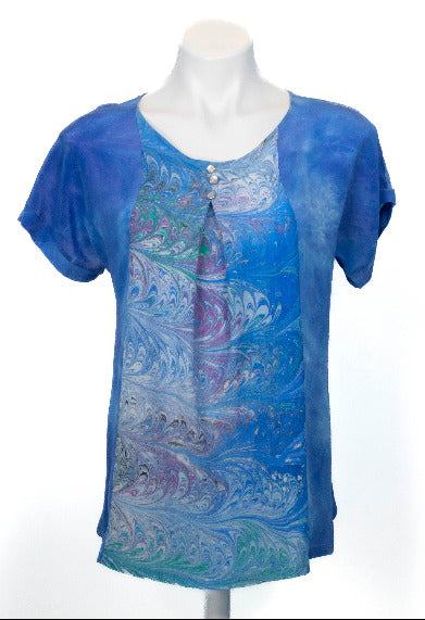 blue silk short sleeve top with marbled inset in front panel