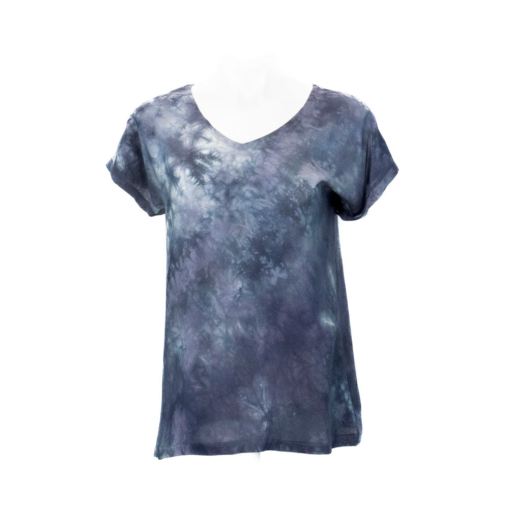 Hand dyed grey silk t-shirt on a mannequin against a white background