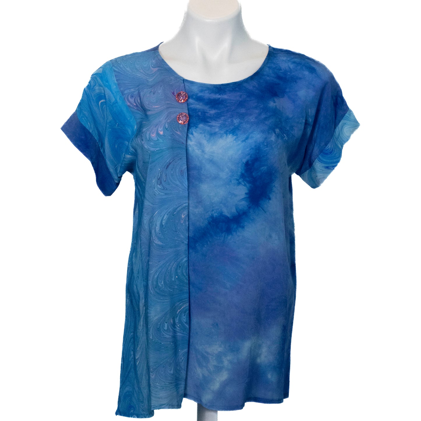 Handy silk top featuring a marbled inset on the right side of the top on a mannequin against a white background