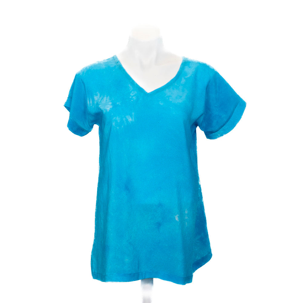 Hand Dyed Turquoise t-shirt on a mannequin against a white background