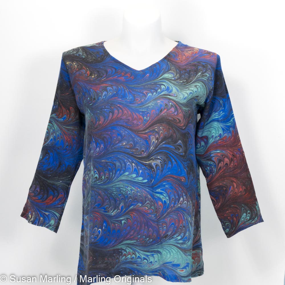 marbled silk top in tunic length. Blue with red, yellow, green in feathered pattern