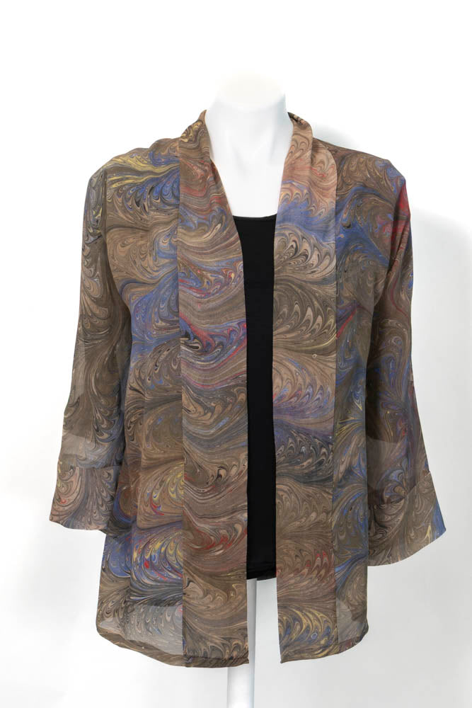 Sheer, brown and gold kimono style jacket shown against a black top on a mannequin against the white background