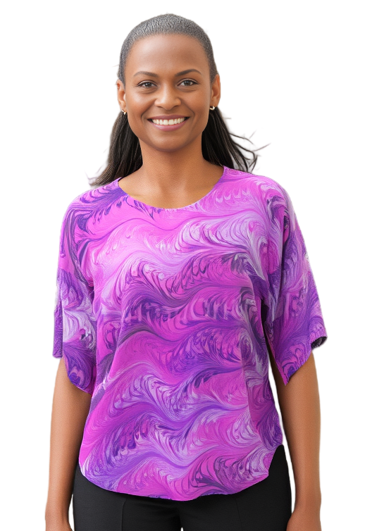 Woman wearing a pink and lilacs hand marbled silk top on a white background