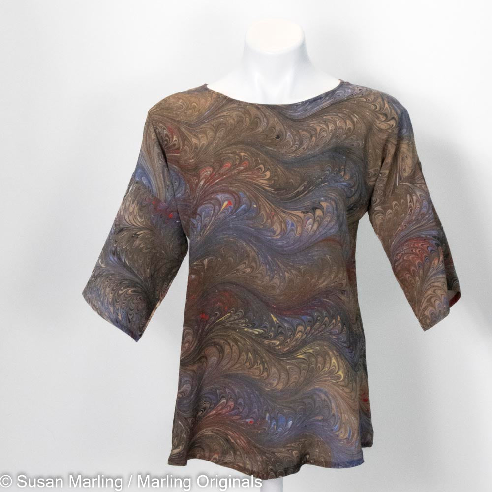 marbled silk blouse in browns, gold, grey and red. Half sleeves. Round neck.