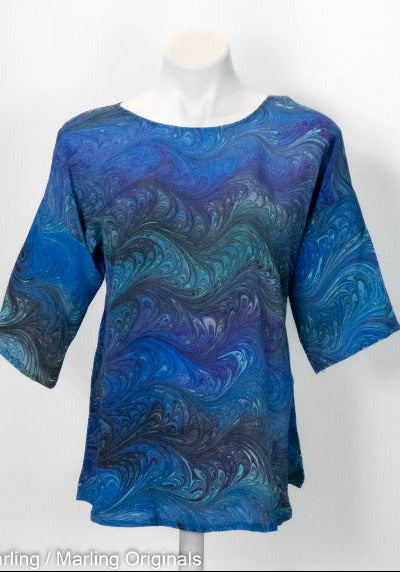 marbled silk blouse in blues, teal with purple and black. Half sleeve and round neck.