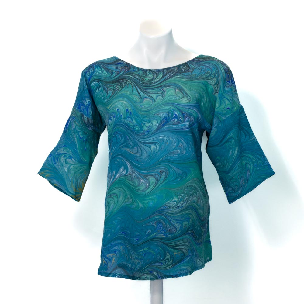round neck artisan silk top marbled in greens and blues. Half sleeve