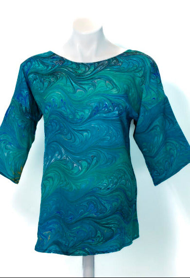 round neck artisan silk top marbled in greens and blues. Half sleeve