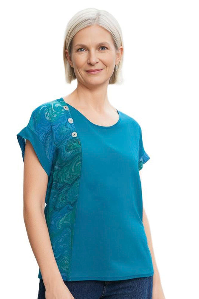 woman wearing jade shirt with jade marbled front panel