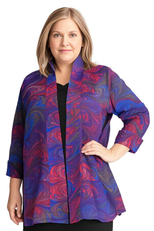 woman wearing a royal, red, purple and brown marbled silk swing jacket