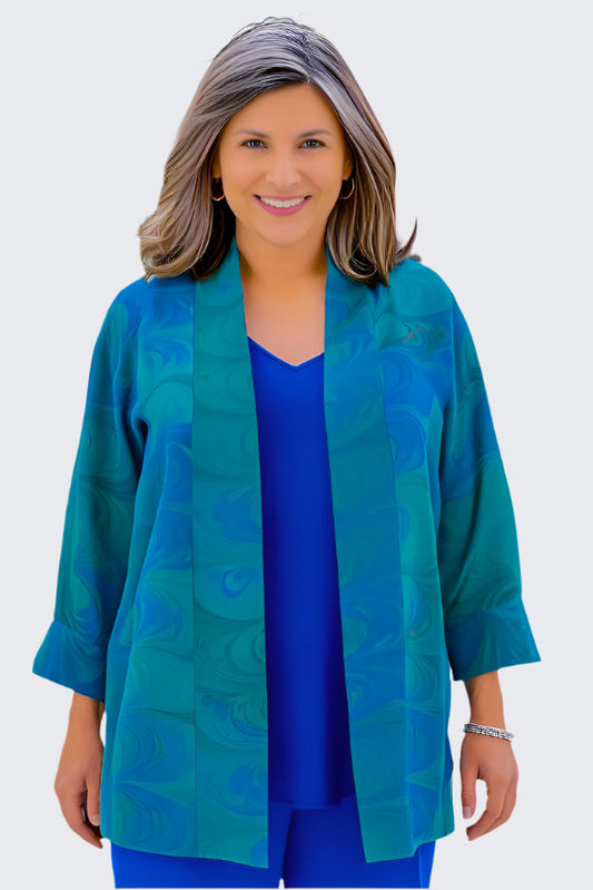 woman wearing emerald color marbled silk swing jacket