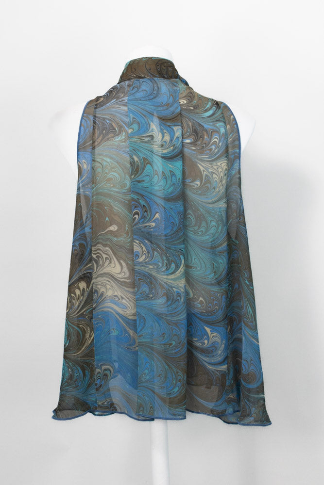 back of sheer marbled silk vest showing pleat in back