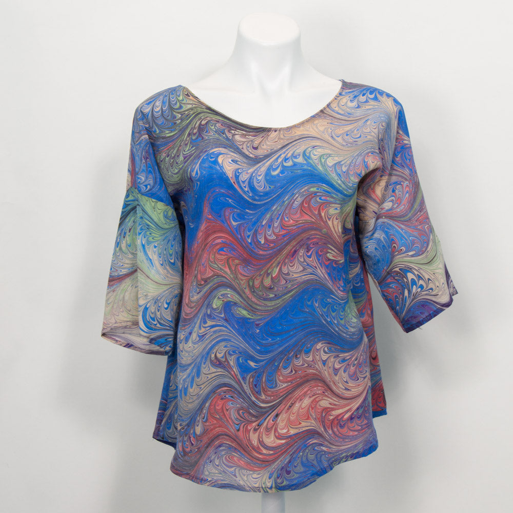 Summer top marbled in feathered pattern in blues, red, sand and celery. Round neck, half sleeve