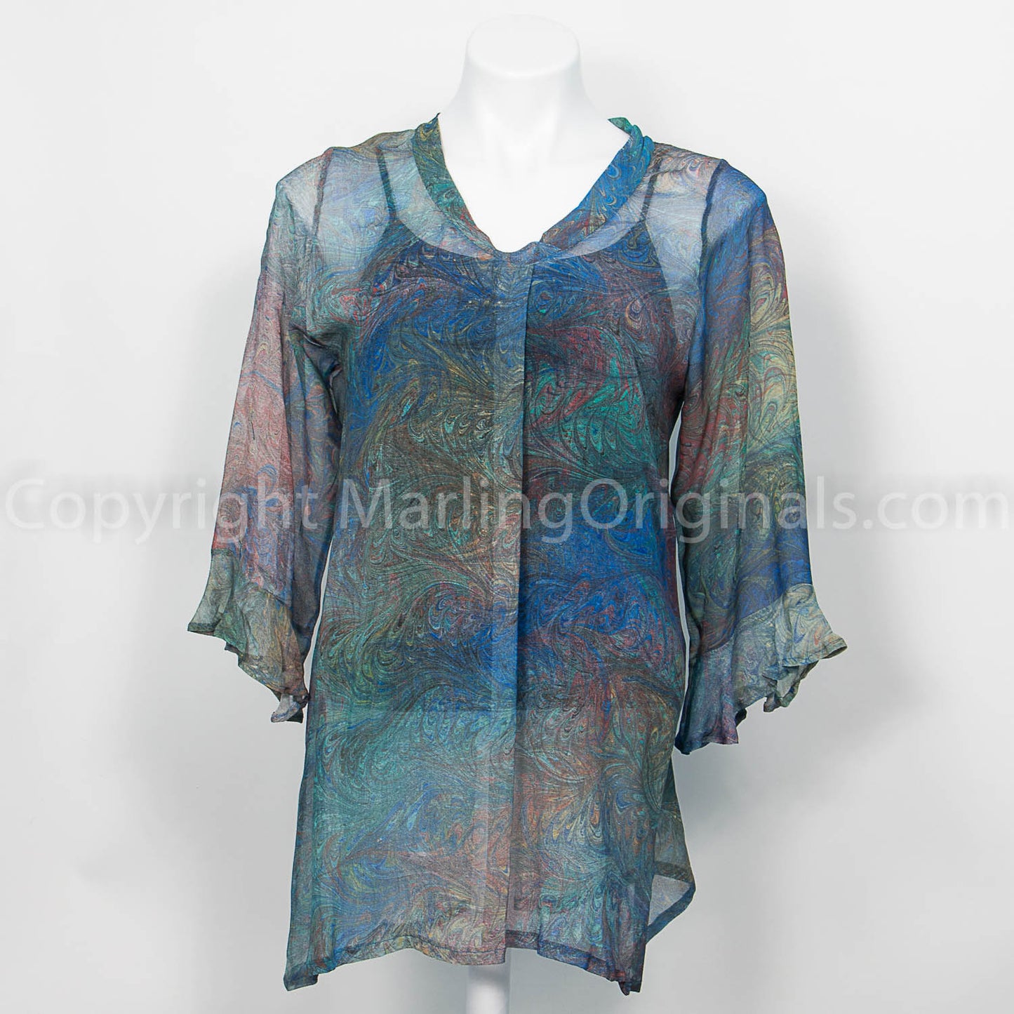sheer double marbled silk tunic. V neck with pleat in front. greens and blues