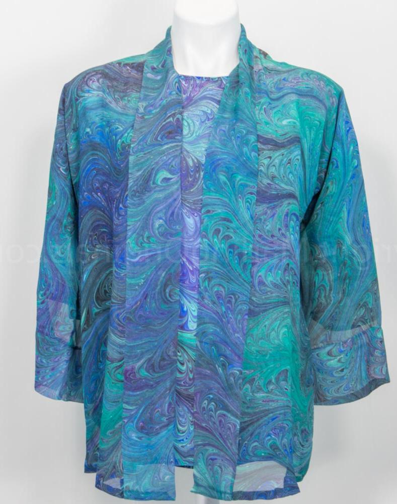 sheer blue kimono in beautiful blues, purple and teal marbled pattern. Shown with matching silk top