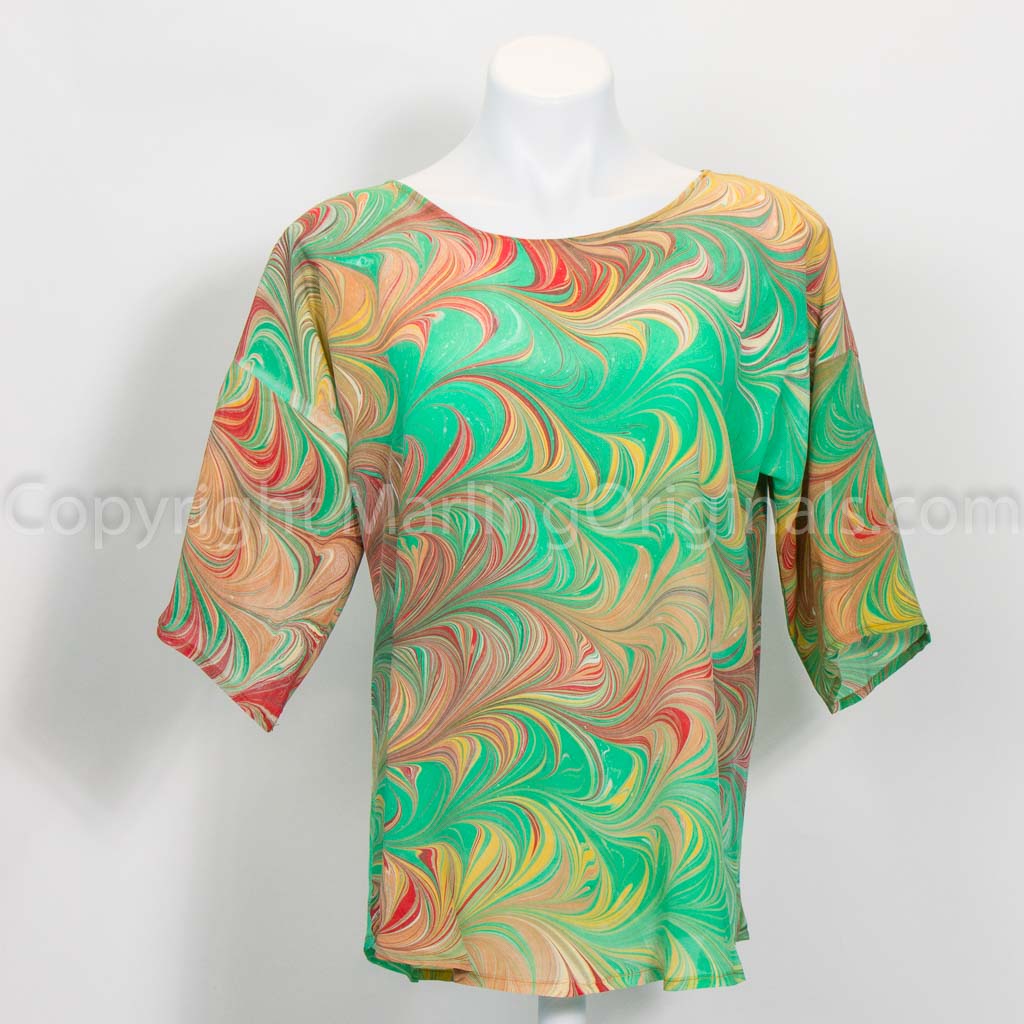 hand marbled silk crepe top in green, gold, sienna, red. Round neck, half sleeve, made in US.