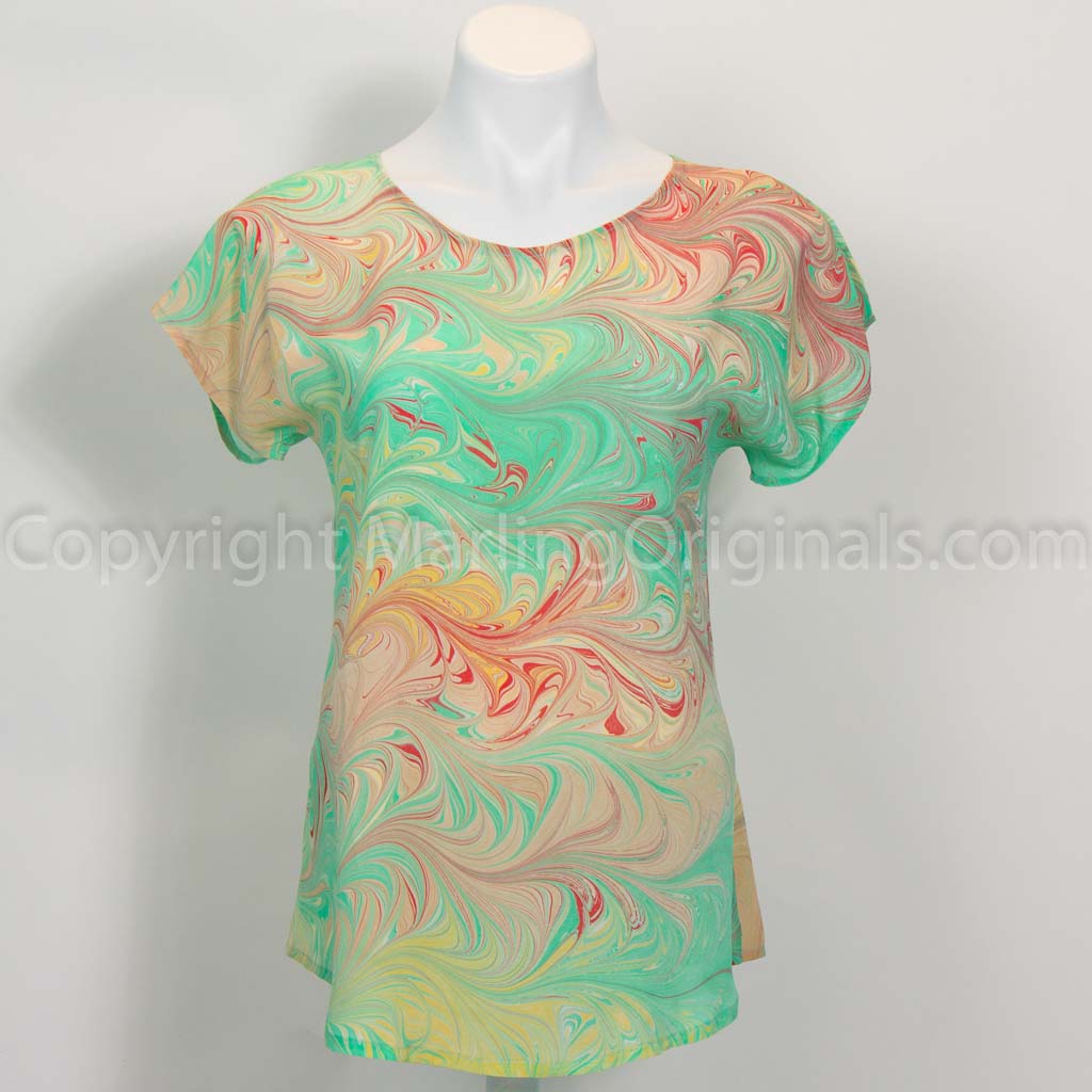 marbled silk short sleeve top in spring green,gold,sienna,red. Round neck, curved hem.