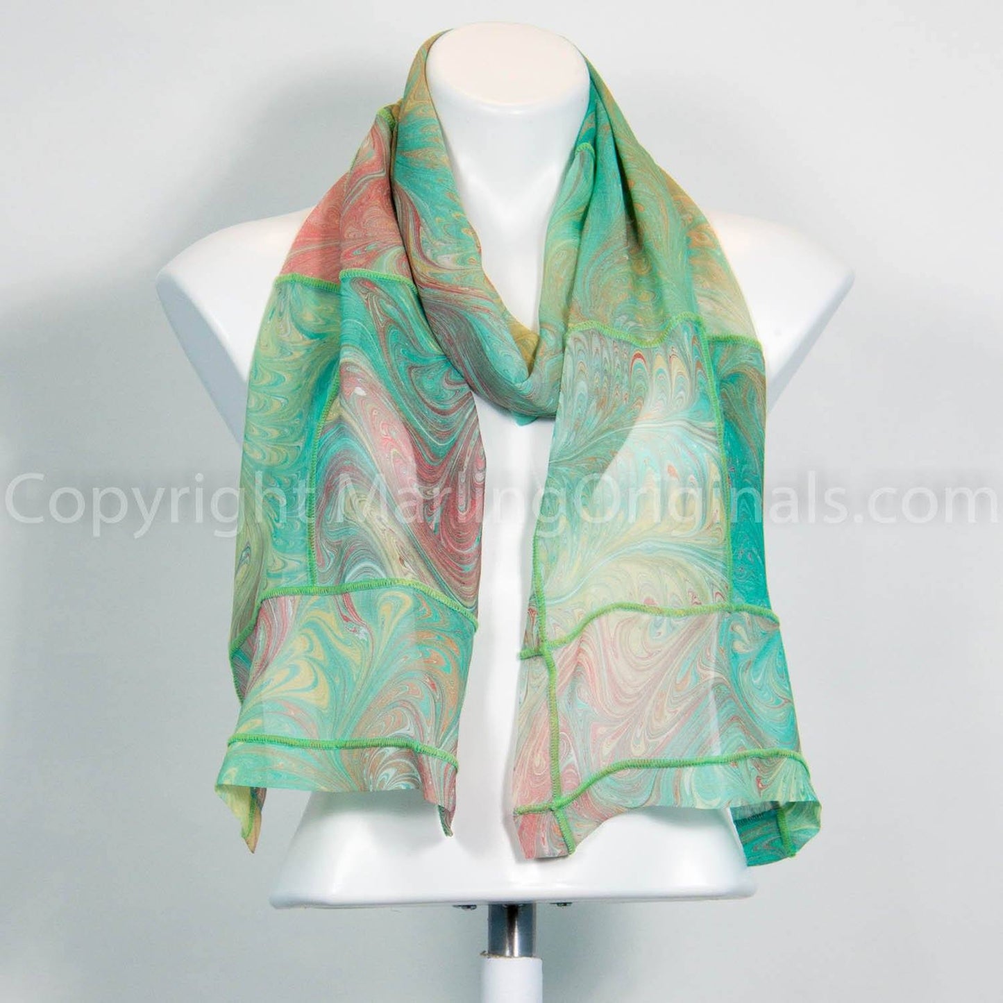 marbled chiffon silk scarf in mint, peach and lime green. Pretty decorative edge.