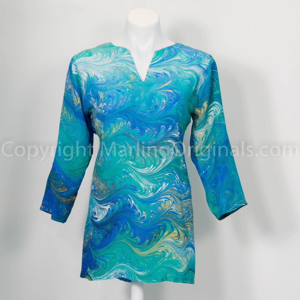 Hand marbled silk tunic in green, blue, yellow, white. V-notch neck, long sleeves.