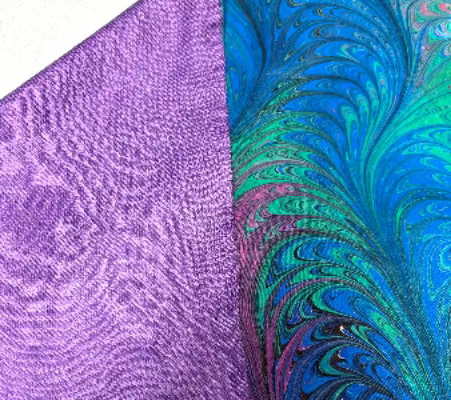 Marbled silk fabric in jewel tones shown with the back side of the scarf - a violet acrylic fabric