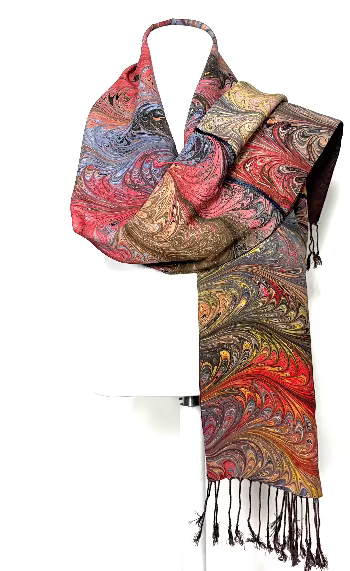 Marbled Silk scarf with intricate patterns on a white background