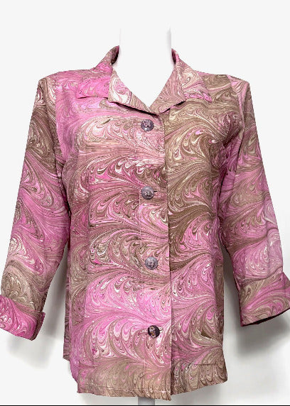 Pink and brown marbled silk jacket on a white background