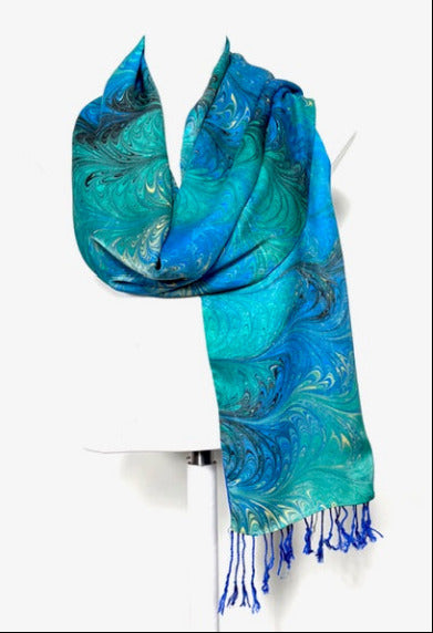 Blue and green marbled silk lined scarf with fringes on a white background