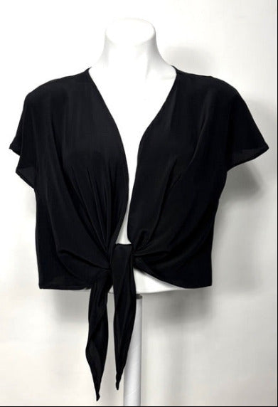 Black silk wrap jacket tied in the front on a mannequin against a white background