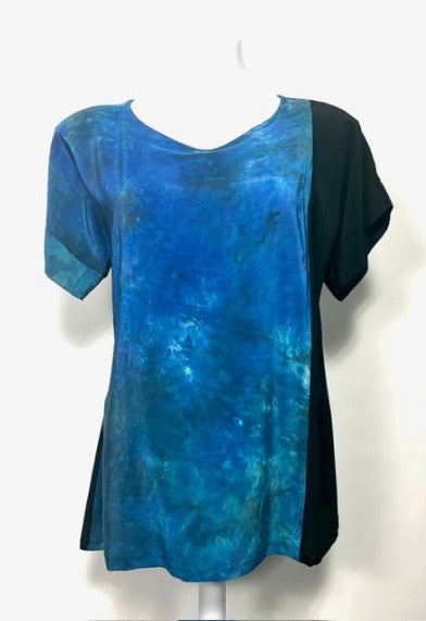 Blue hand dyed silk top with black contrast on a mannequin