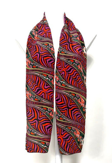 Colorful patterned silk scarf on a white background