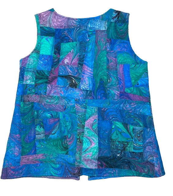 Back of a blue and green marbled silk patchwork quilted vest 