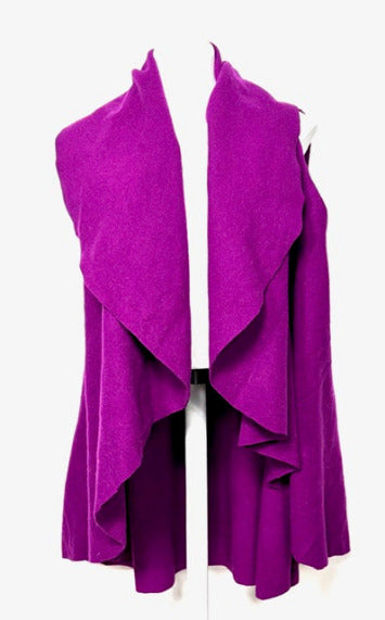 wool vest in a bright raspberry color on a mannequin