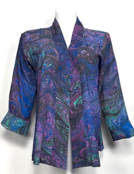 Colorful marbled silk swing jacket in beautiful jewel tones on a white background