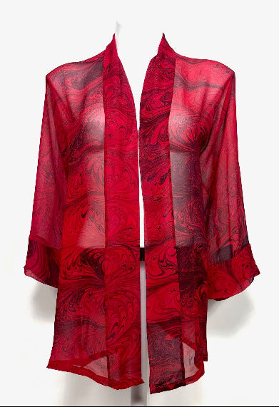 Red and black marbled silk kimono jacket on a white background