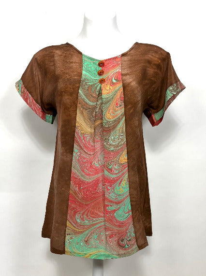 Brown top with colorful marbled pattern on a white background