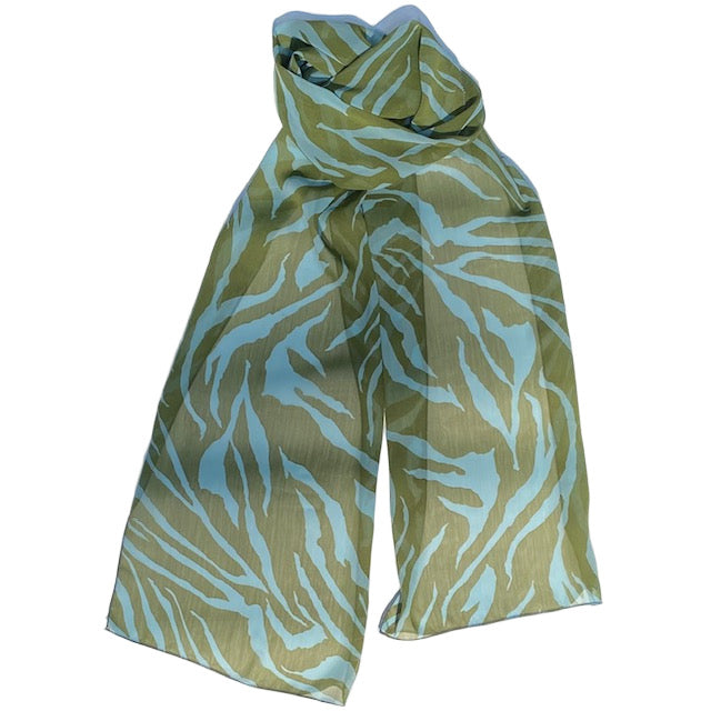 Green and blue patterned scarf against a white background