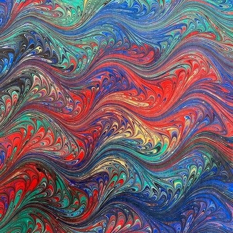 Colorful marbled pattern with wavy textures in red, blue, green, and purple.