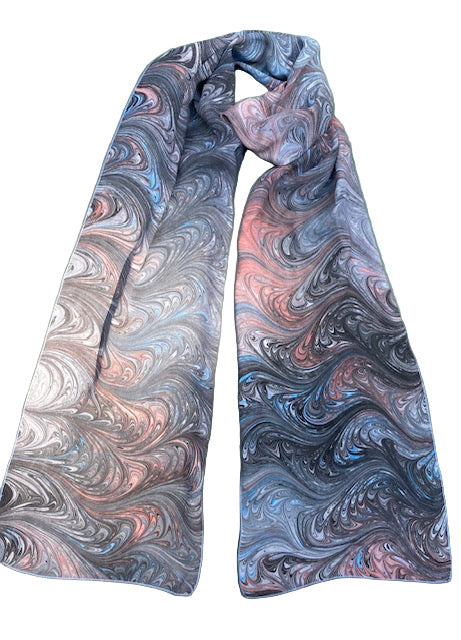 Marbled patterned scarf on a white background