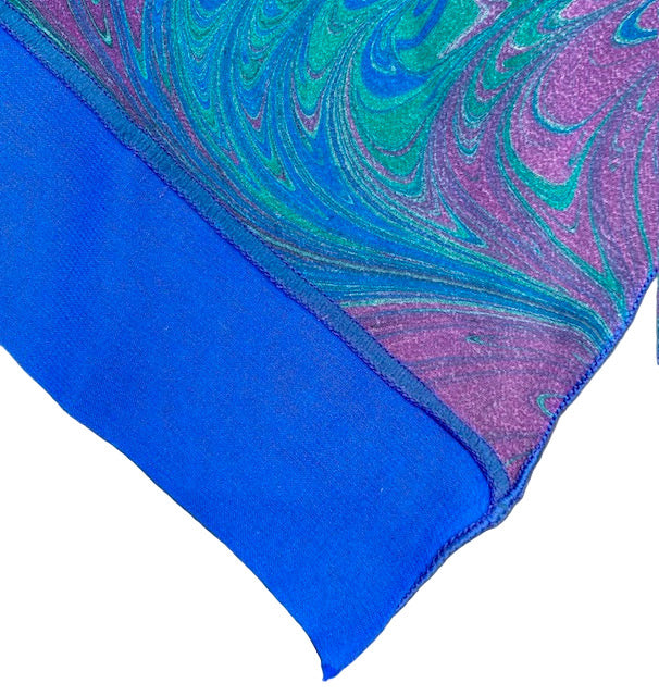 Finished edge detail of marbled silk scarf