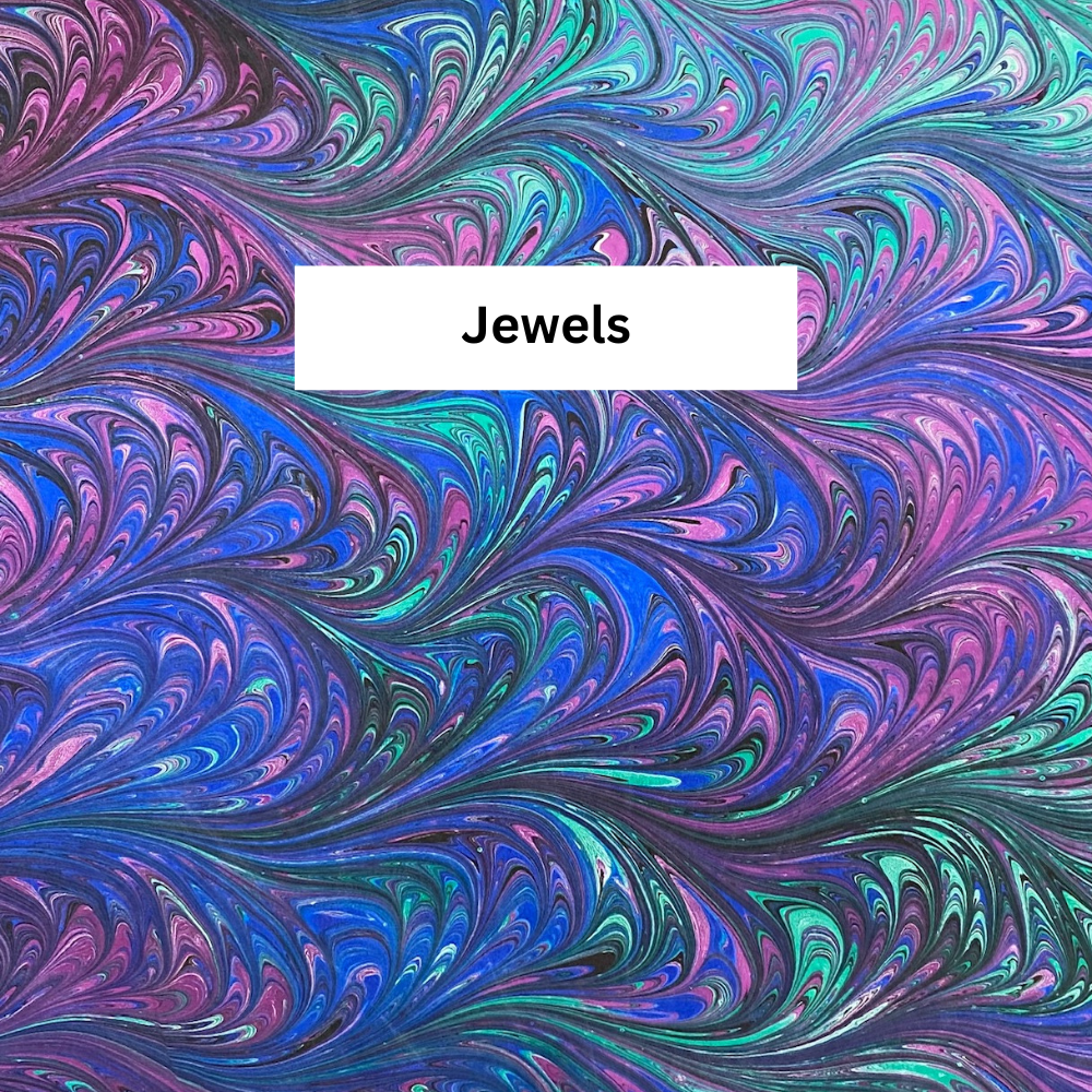 Colorful marbled pattern in blue, green and violet with the word 'Jewels' in the center.