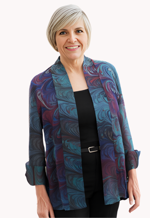 Woman wearing a marbled silk sheer jacket standing against a white background