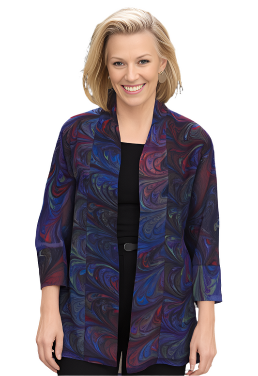 Woman wearing a marbled silk sheer kimono in brown, blue, red and celery 