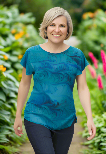 woman wearing a marbled silk top 