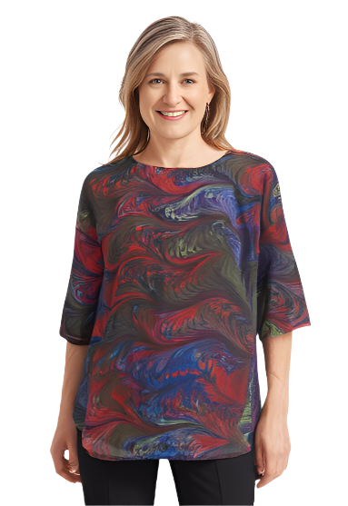 Woman wearing a colorful marbled silk  top and black pants on a white background