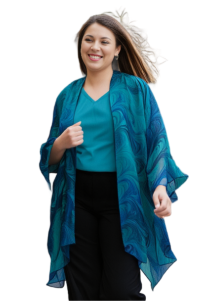 Woman wearing a blue kimono-style wrap  on a white background