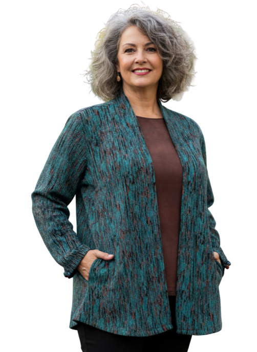 woman wearing a abstract teal and brown jacket over a brown shirt