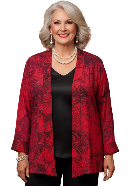 Woman in a red and black silk marbled jacket and black pants 
