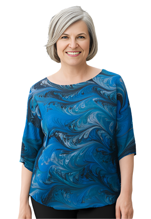 Woman wearing a blue marbled silk top in blue, aqua, black and white colors